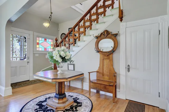 a kitchen with stainless steel appliances granite countertop a stove and a refrigerator
