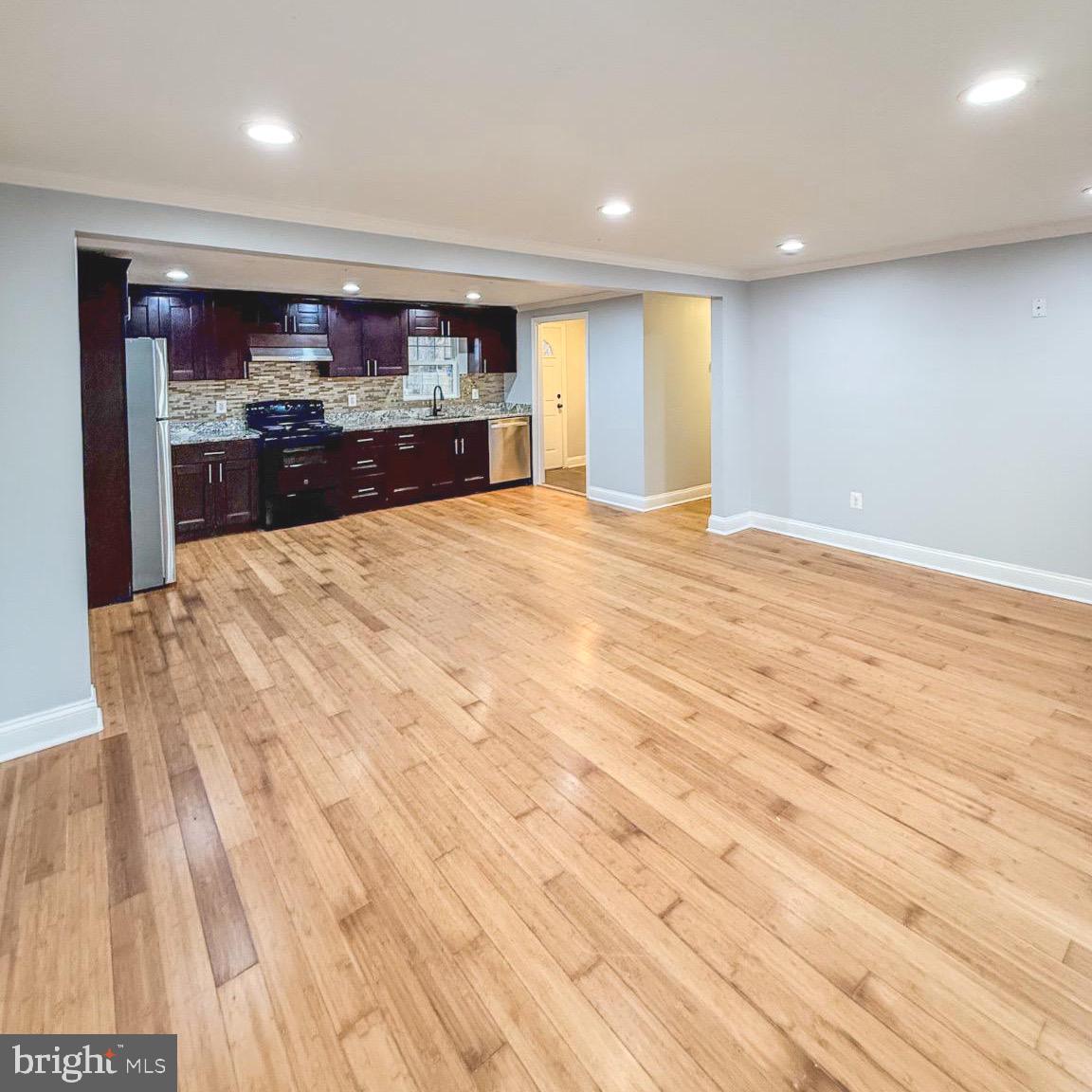 205 Biddle Road Accokeek, MD 20607 - Photo 18 of 31 a large room with kitchen view