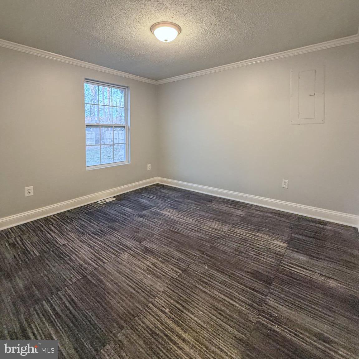 205 Biddle Road Accokeek, MD 20607 - Photo 23 of 31 wooden floor in an empty room with a window