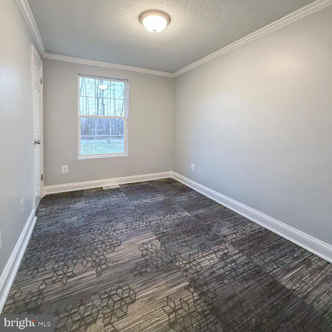 205 Biddle Road Accokeek, MD 20607 - Photo 25 of 31 an empty room with windows