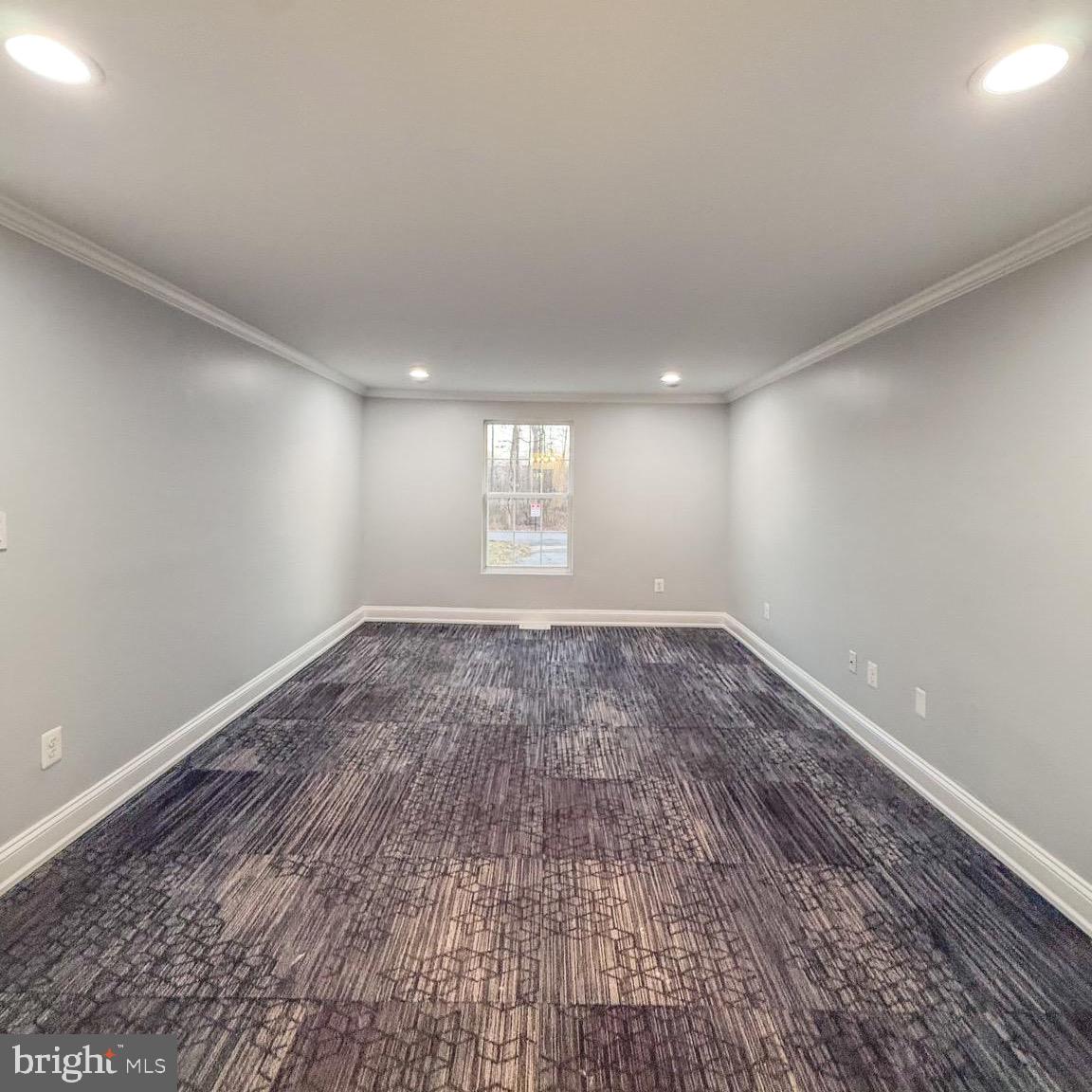 205 Biddle Road Accokeek, MD 20607 - Photo 27 of 31 a view of empty room with wooden floor