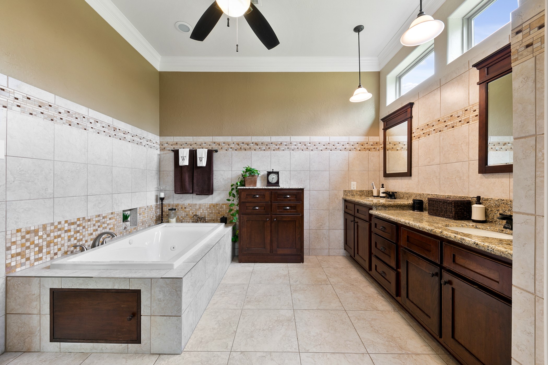 923 Y U Jones Road Richmond, TX 77469 - Photo 14 of 50 a large kitchen with a sink and a stove top oven
