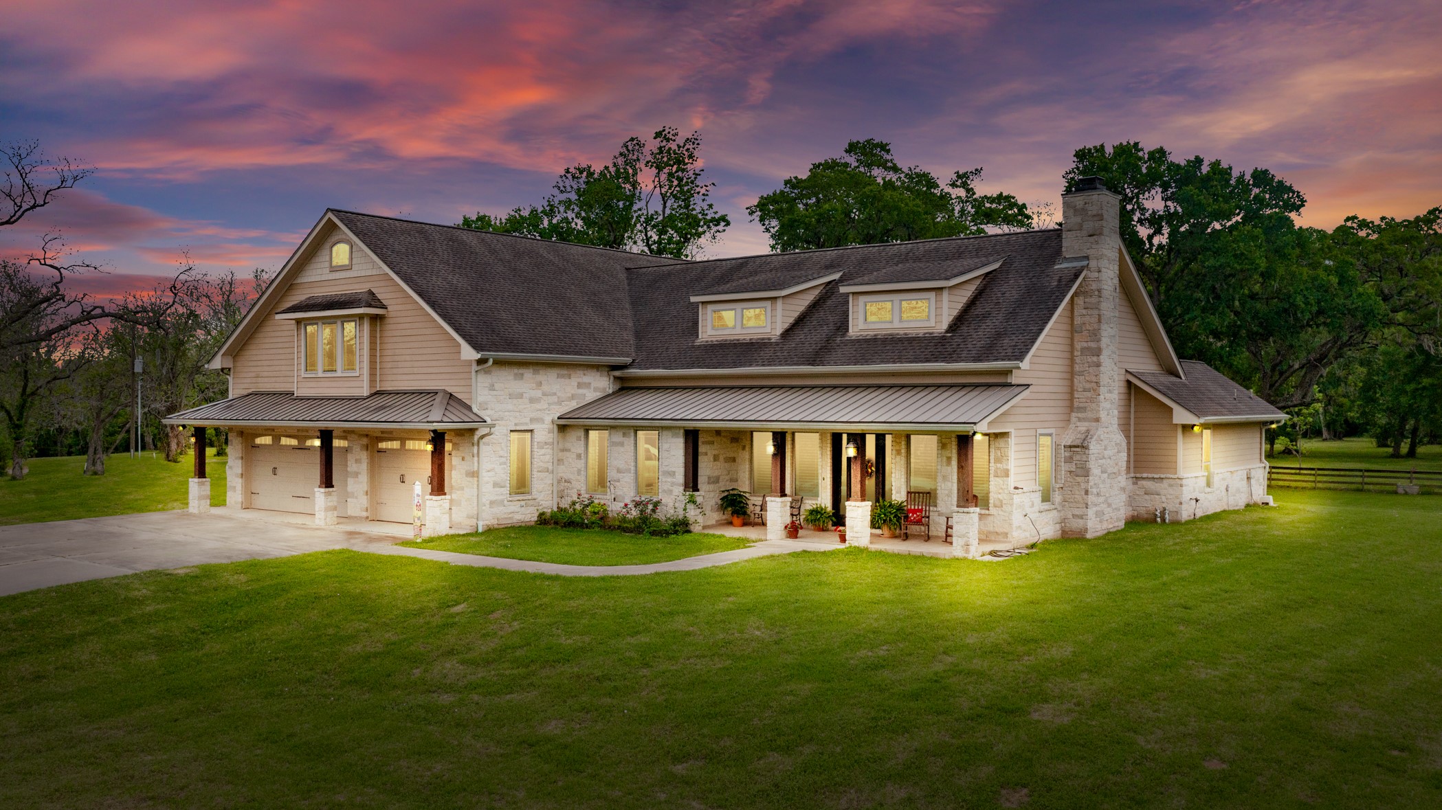 923 Y U Jones Road Richmond, TX 77469 - Photo 2 of 50 a front view of a house with a yard table and chairs