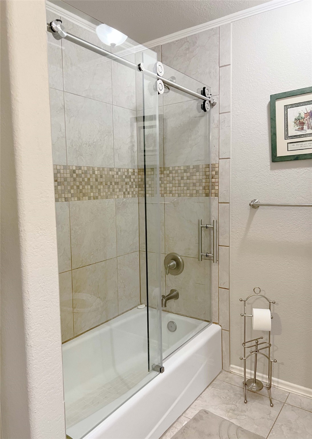 923 Y U Jones Road Richmond, TX 77469 - Photo 31 of 50 a bathroom with a tub and a shower