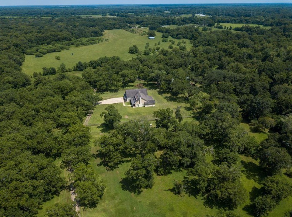 923 Y U Jones Road Richmond, TX 77469 - Photo 6 of 50 an aerial view of a houses with a yard