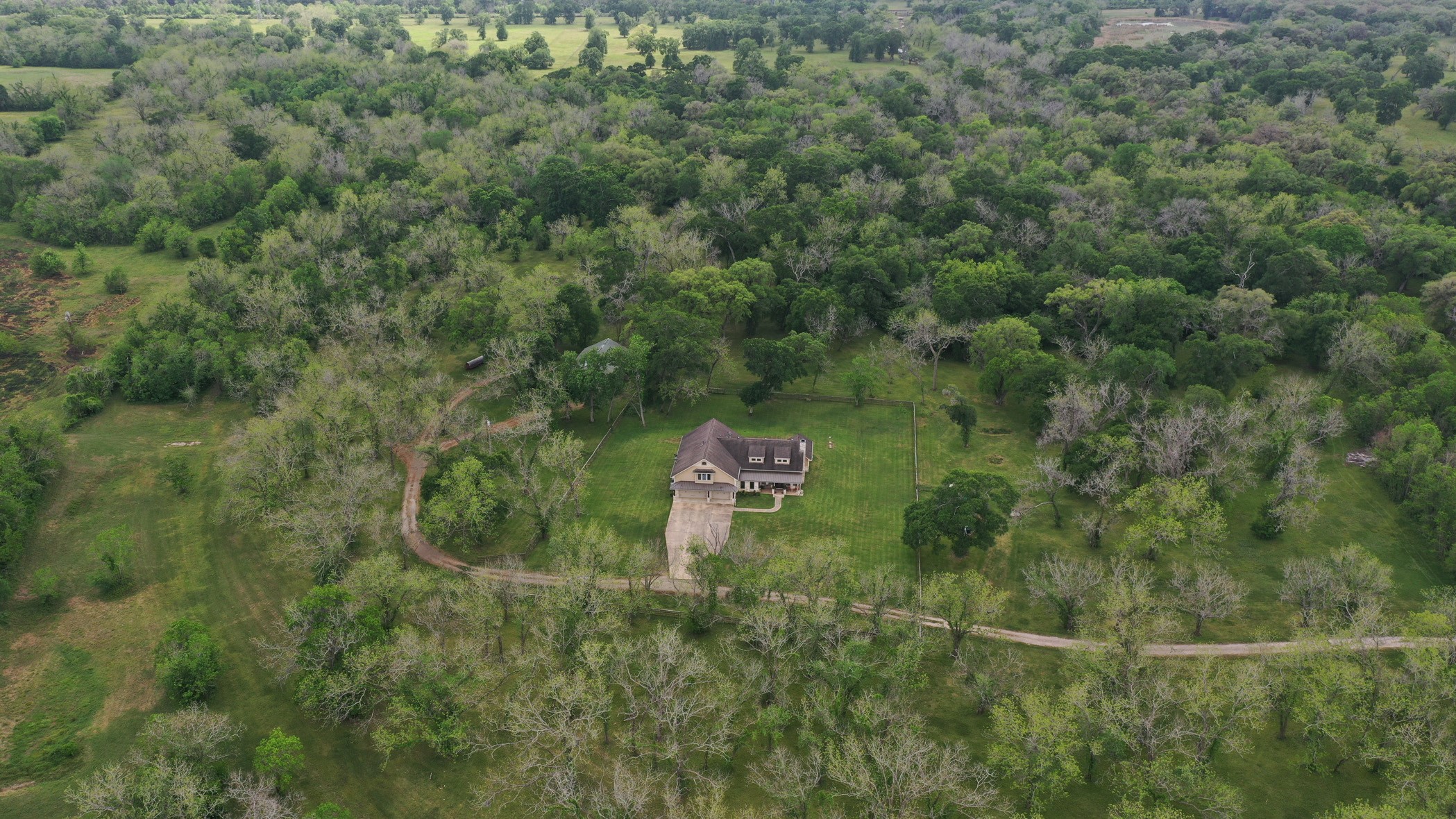 923 Y U Jones Road Richmond, TX 77469 - Photo 7 of 50 a aerial view of a house with a yard