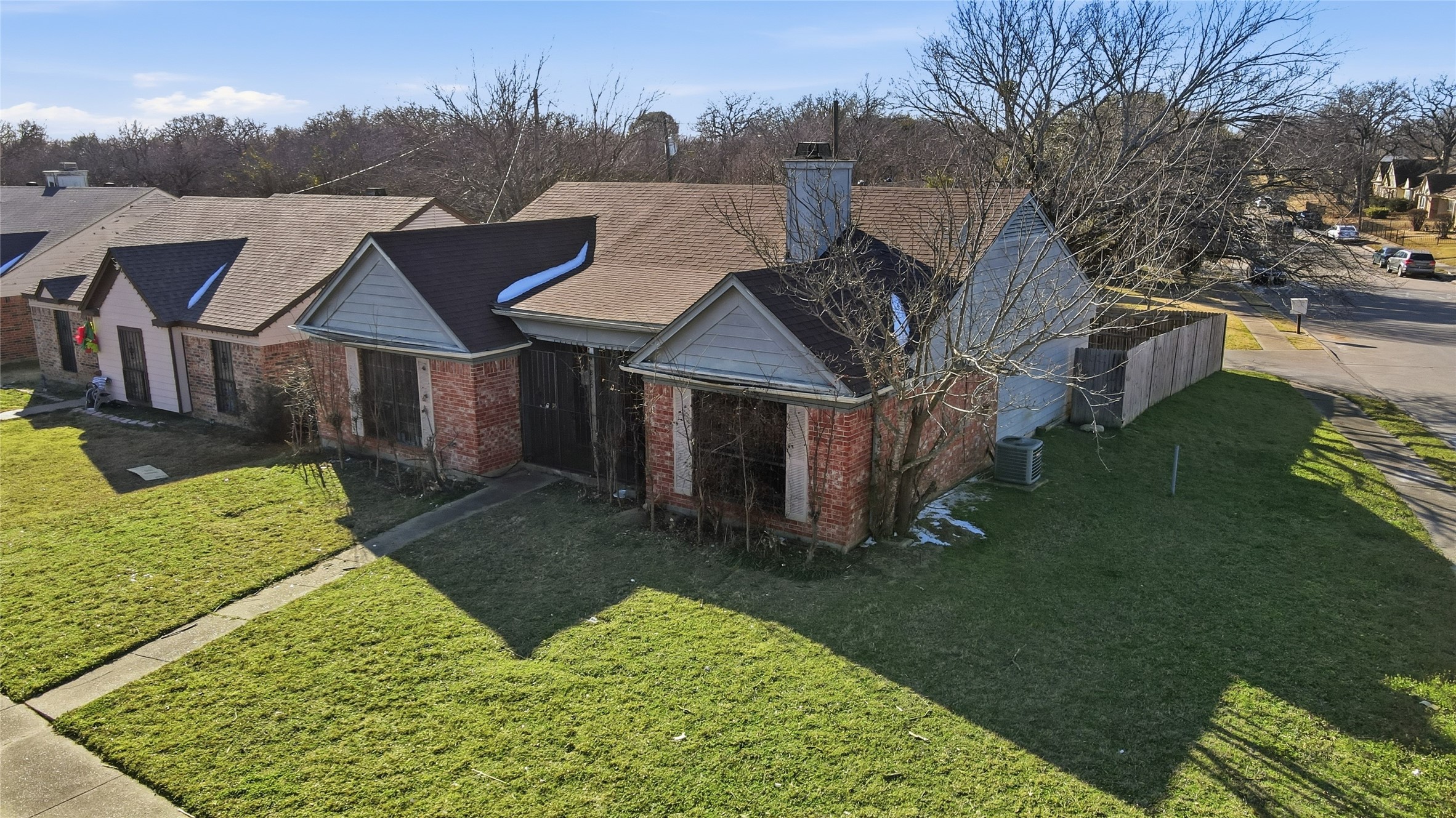 815 Apache Drive Dallas, TX 75217 - Photo 3 of 6 a front view of a house with a yard