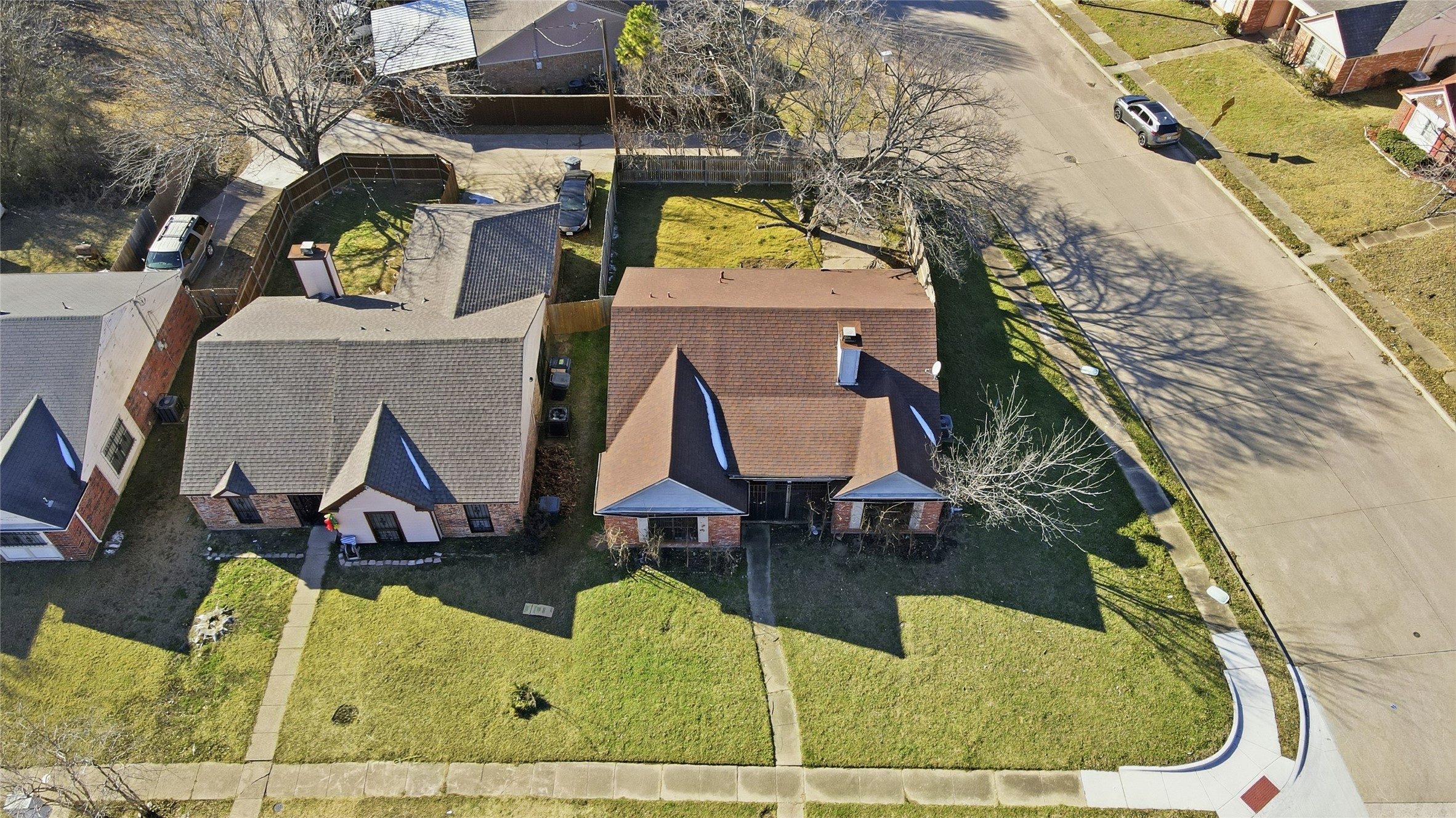 815 Apache Drive Dallas, TX 75217 - Photo 5 of 6 an aerial view of a house with swimming pool