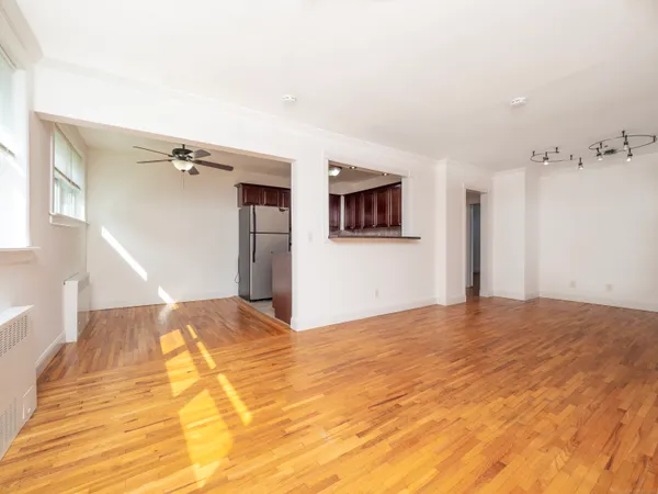 a view of a livingroom with a & kitchen