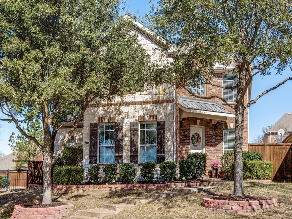 2118 Fox Ridge Trail Frisco, TX 75036 - Photo 1 of 1 a front view of a building with street view