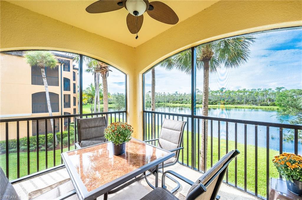 9727 Acqua Court, Unit 421 Naples, FL 34113 - Photo 24 of 35 a view of a balcony with furniture