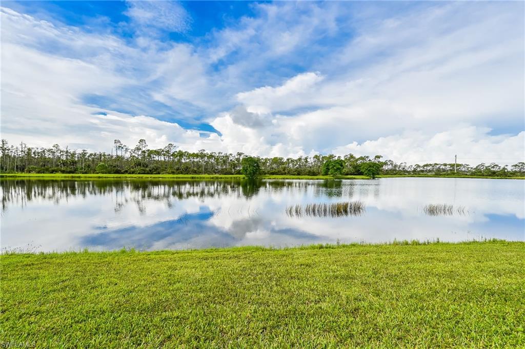 9727 Acqua Court, Unit 421 Naples, FL 34113 - Photo 26 of 35 a lake view with a lake view