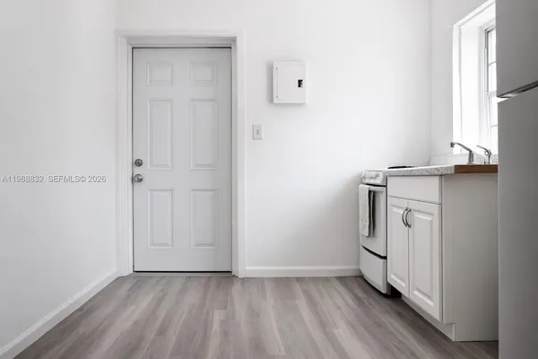a view of a storage and utility room in a house