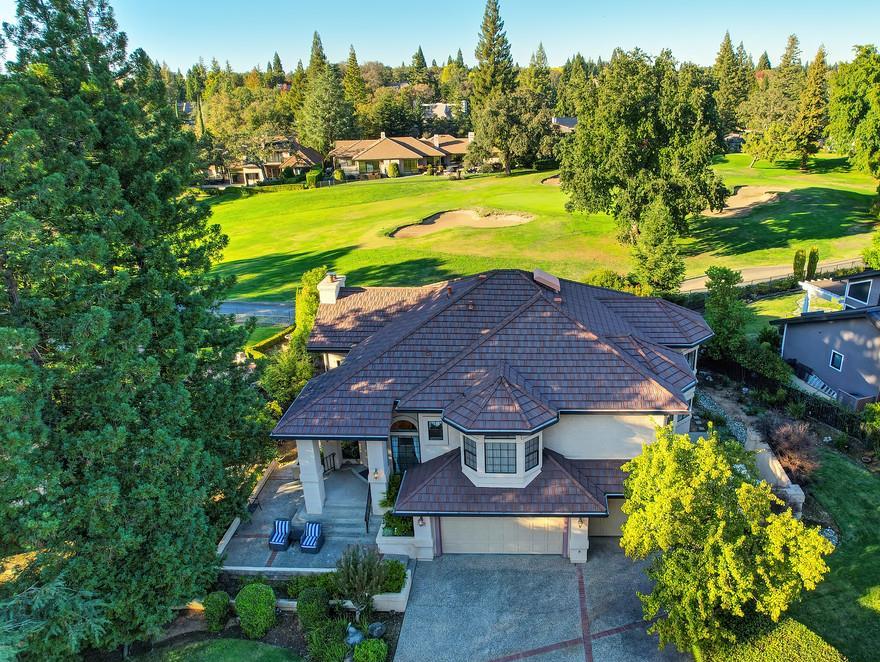 14965 Anillo Way Rancho Murieta, CA 95683 - Photo 2 of 59 an aerial view of a house with a garden