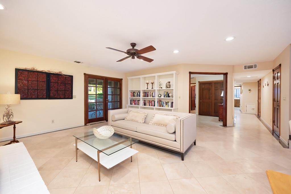 14965 Anillo Way Rancho Murieta, CA 95683 - Photo 21 of 59 a living room with furniture and a flat screen tv
