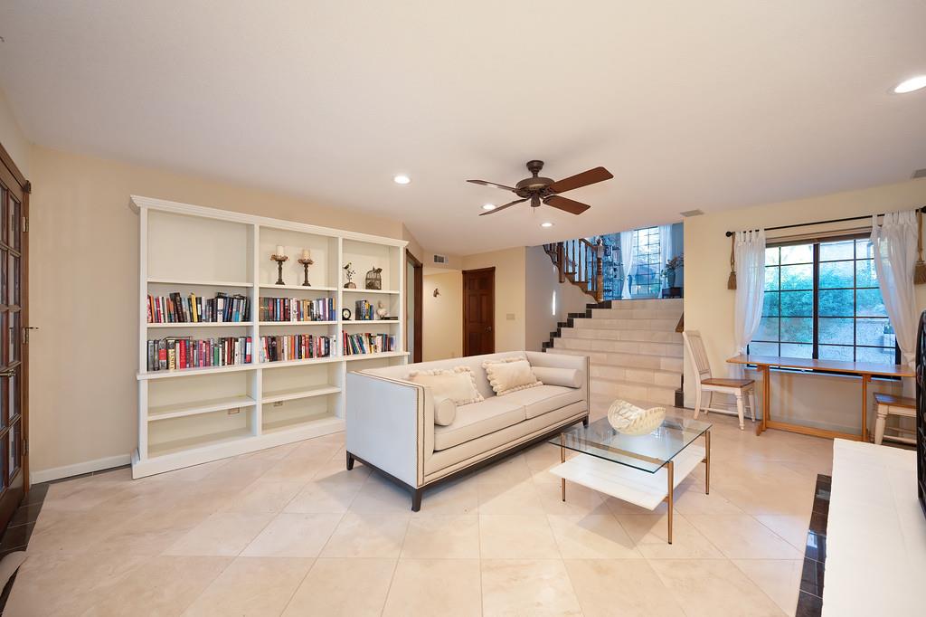 14965 Anillo Way Rancho Murieta, CA 95683 - Photo 22 of 59 a living room with furniture and a large window