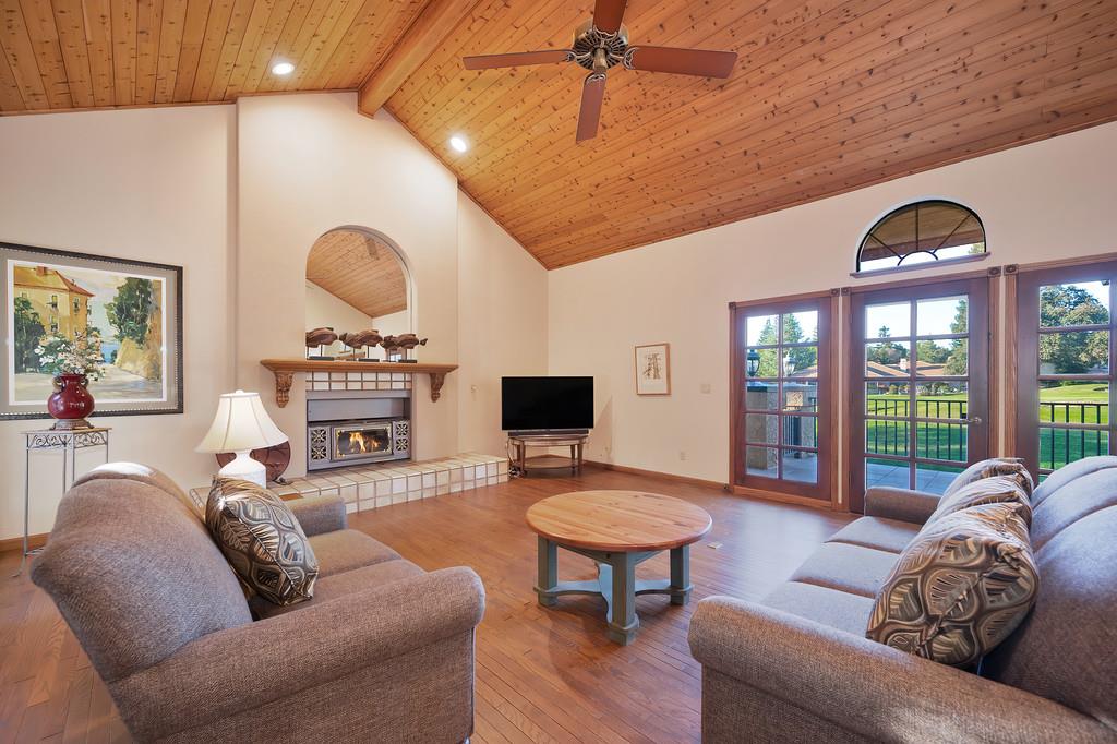 14965 Anillo Way Rancho Murieta, CA 95683 - Photo 4 of 59 a living room with furniture a fireplace and a flat screen tv
