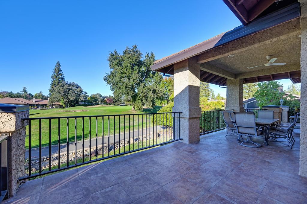 14965 Anillo Way Rancho Murieta, CA 95683 - Photo 43 of 59 a view of a porch with furniture and a backyard