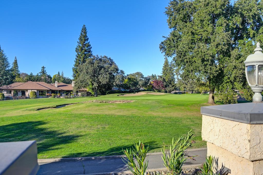 14965 Anillo Way Rancho Murieta, CA 95683 - Photo 46 of 59 a view of a garden with a building in the background