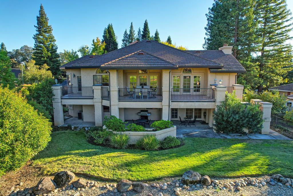 14965 Anillo Way Rancho Murieta, CA 95683 - Photo 50 of 59 a view of a house with a garden