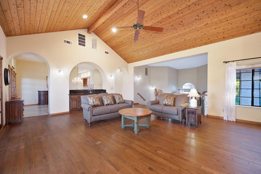 14965 Anillo Way Rancho Murieta, CA 95683 - Photo 6 of 59 a living room with furniture and a large window