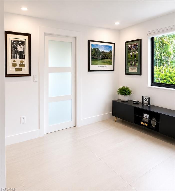 4556 Eagle Key Circle Naples, FL 34112 - Photo 26 of 29 Office / Bedroom 3 w/ pocket doors