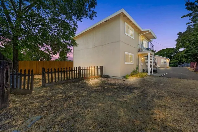 a view of backyard of house