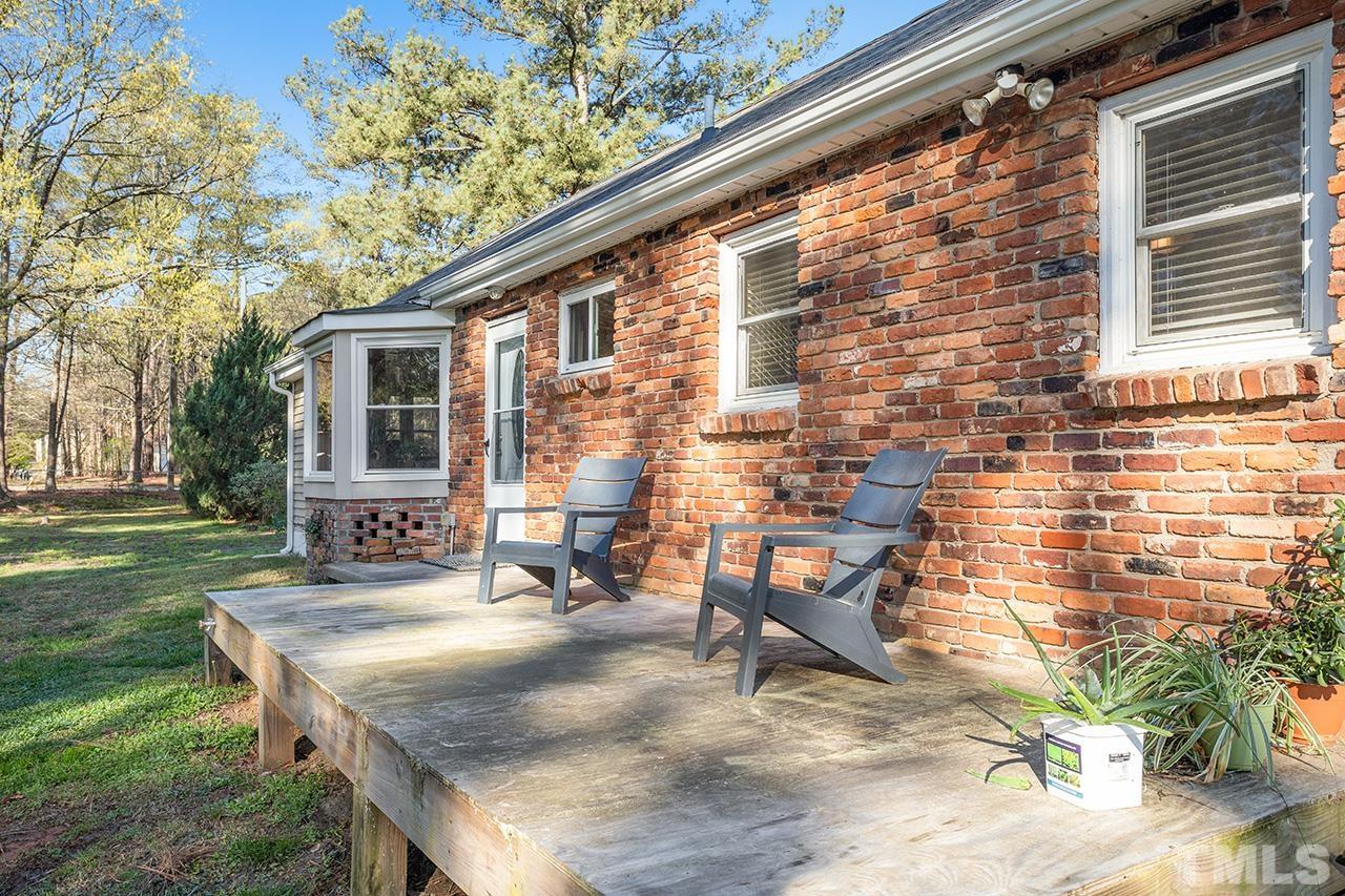 2820 Willow Court Raleigh, NC 27610 - Photo 23 of 33 a view of backyard with outdoor seating