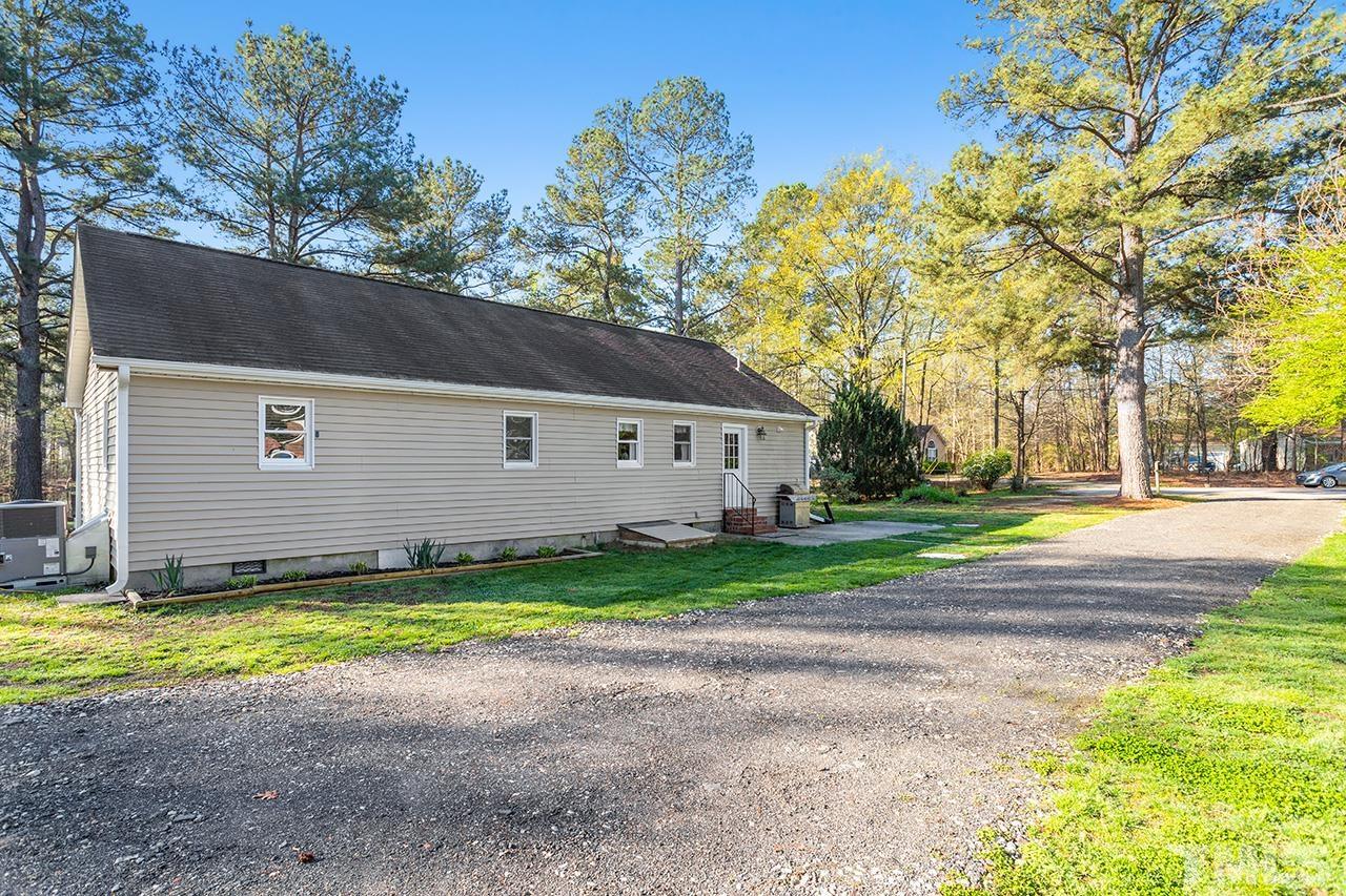 2820 Willow Court Raleigh, NC 27610 - Photo 29 of 33 a view of a house with a backyard