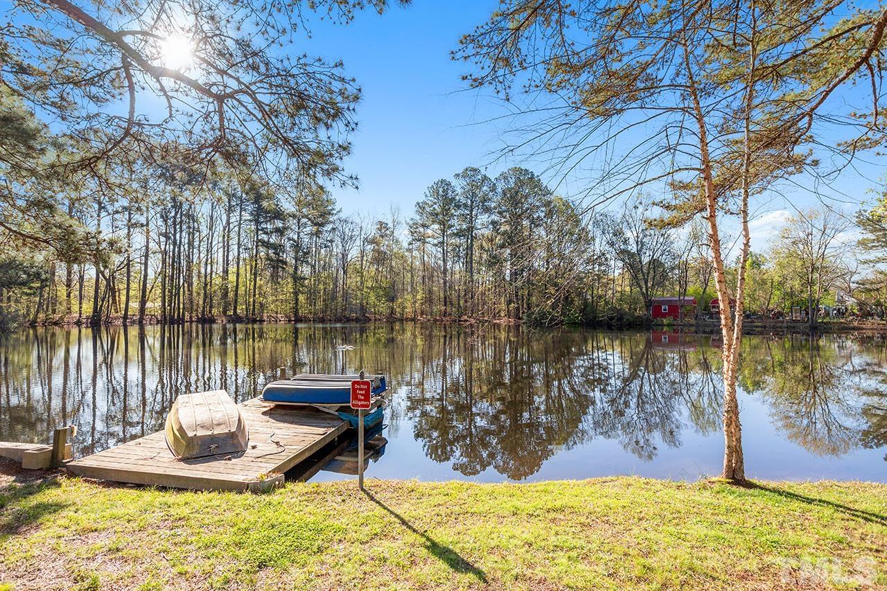 2820 Willow Court Raleigh, NC 27610 - Photo 3 of 33 a lake view with a sitting space and lake view