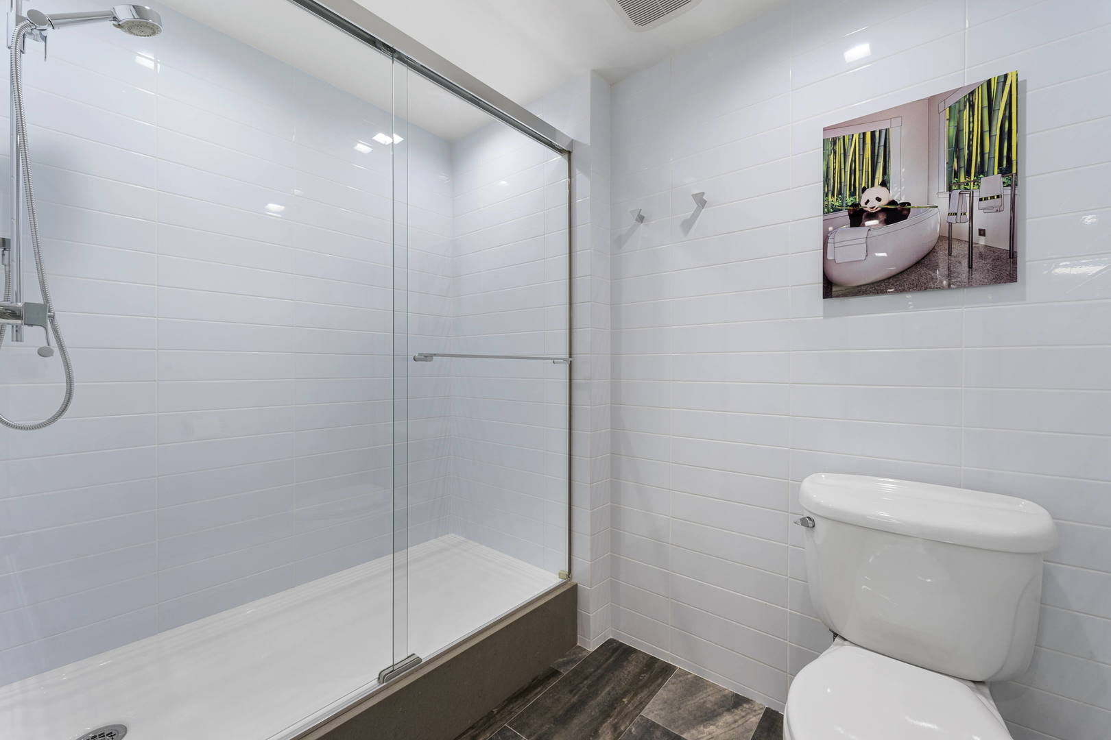 1615 East Central Road, Unit 222C Arlington Heights, IL 60005 - Photo 16 of 30 a bathroom with a toilet and a shower