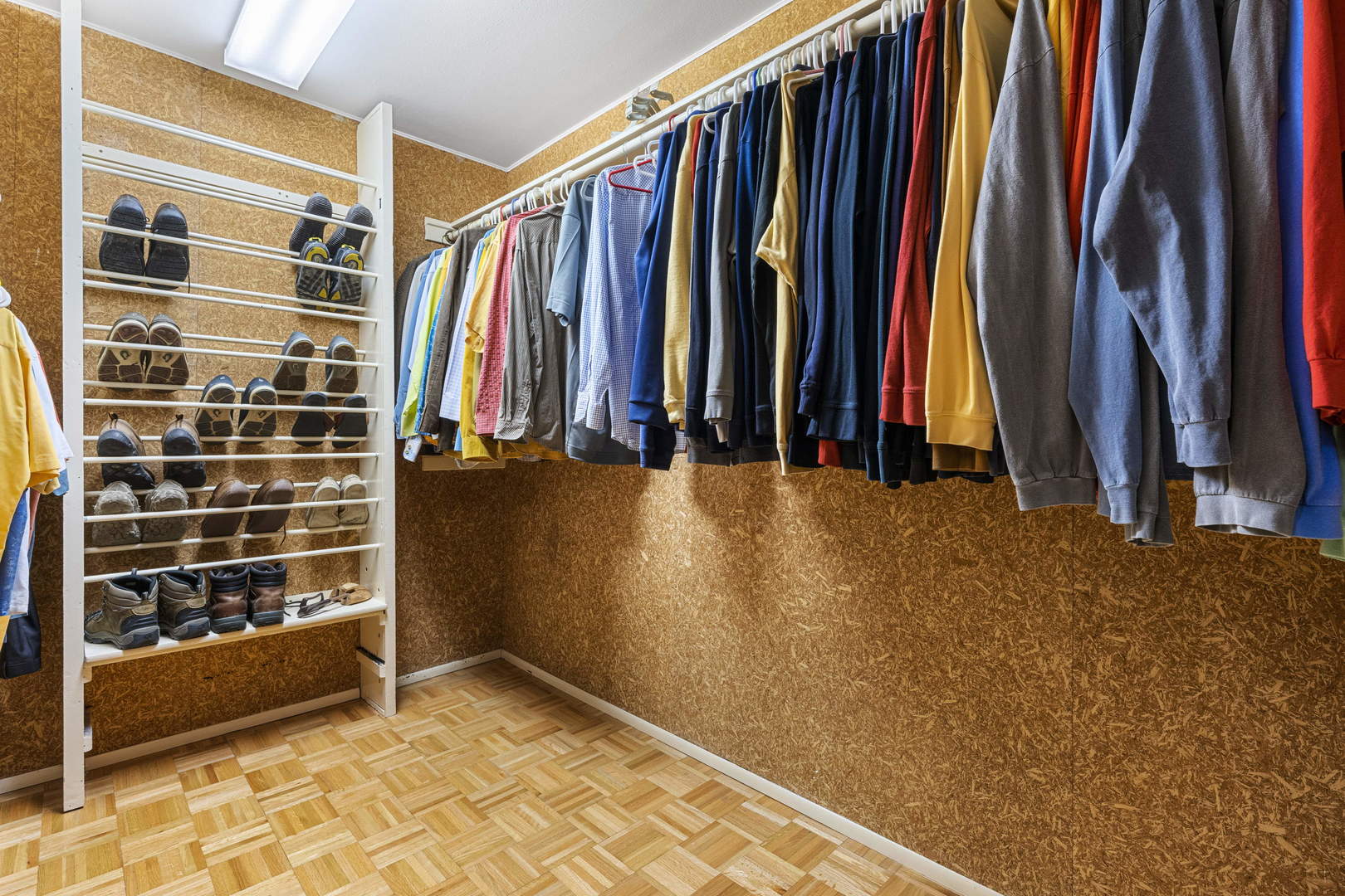 1615 East Central Road, Unit 222C Arlington Heights, IL 60005 - Photo 17 of 30 a view of walk in closet with clothes