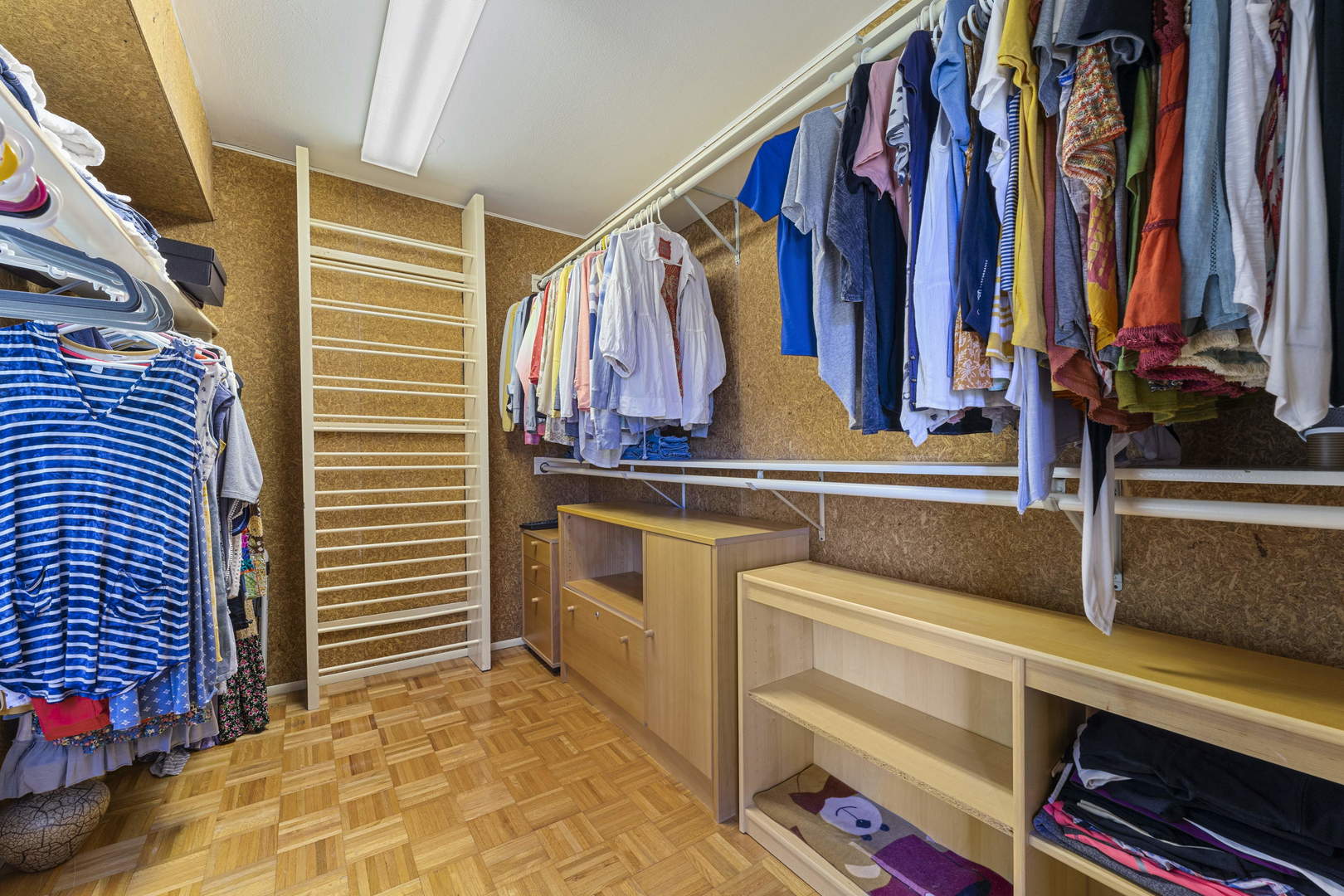 1615 East Central Road, Unit 222C Arlington Heights, IL 60005 - Photo 20 of 30 a view of walk in closet with clothes and shoes