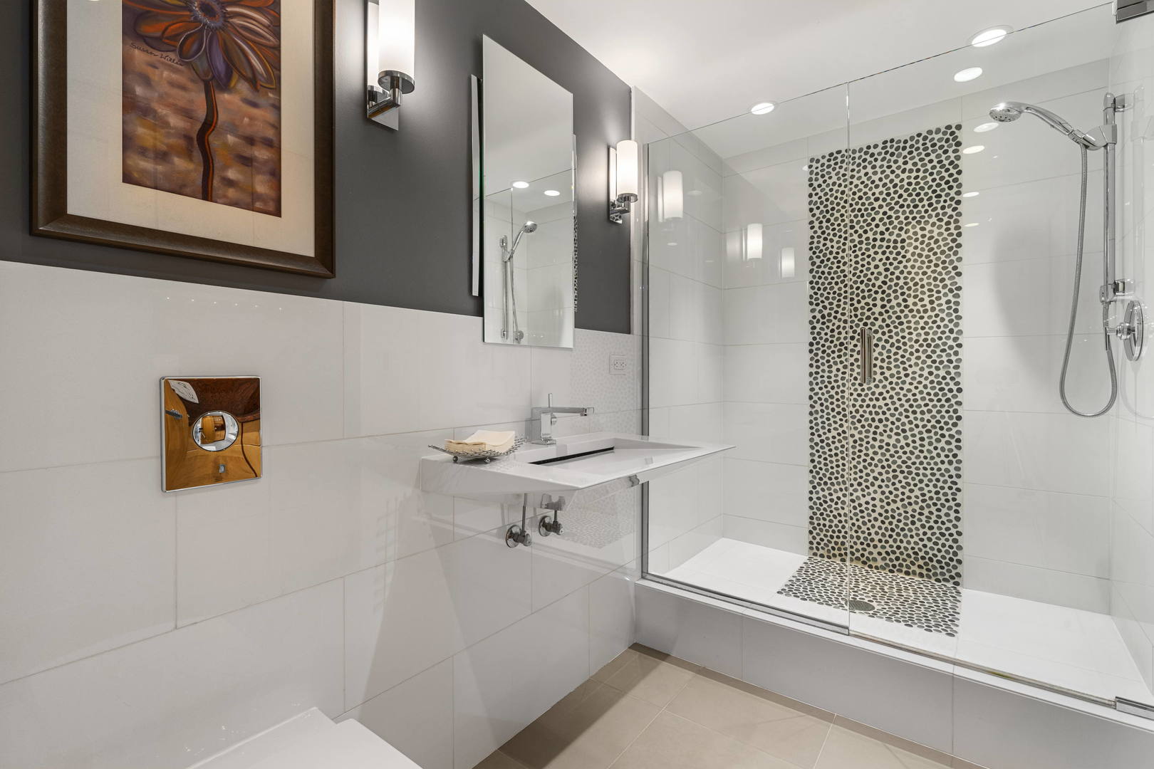 1615 East Central Road, Unit 222C Arlington Heights, IL 60005 - Photo 21 of 30 a bathroom with a sink a toilet and shower