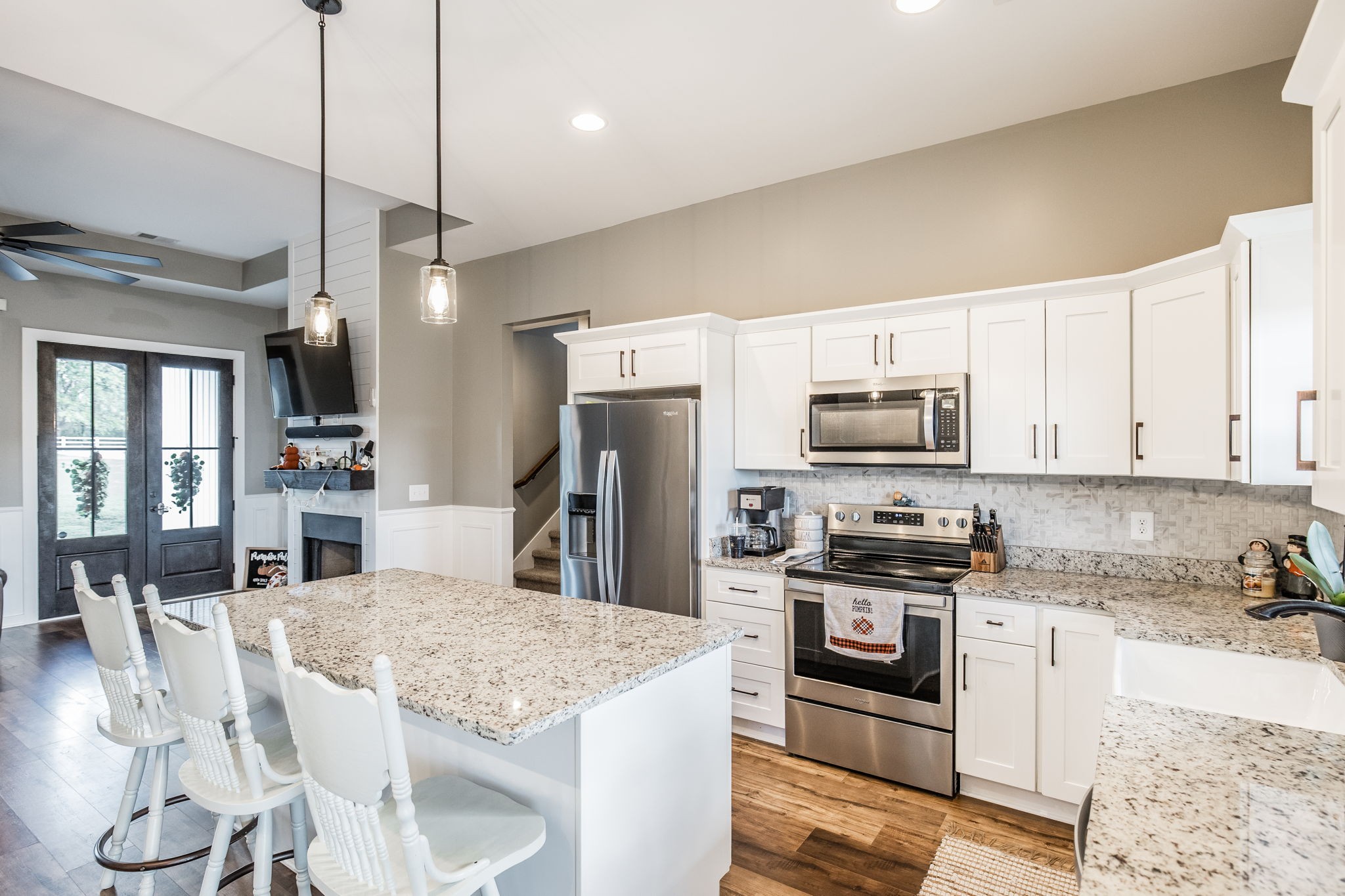 721 New Deal Potts Road Cottontown, TN 37048 - Photo 16 of 73 a kitchen with stainless steel appliances kitchen island granite countertop a stove refrigerator and cabinets