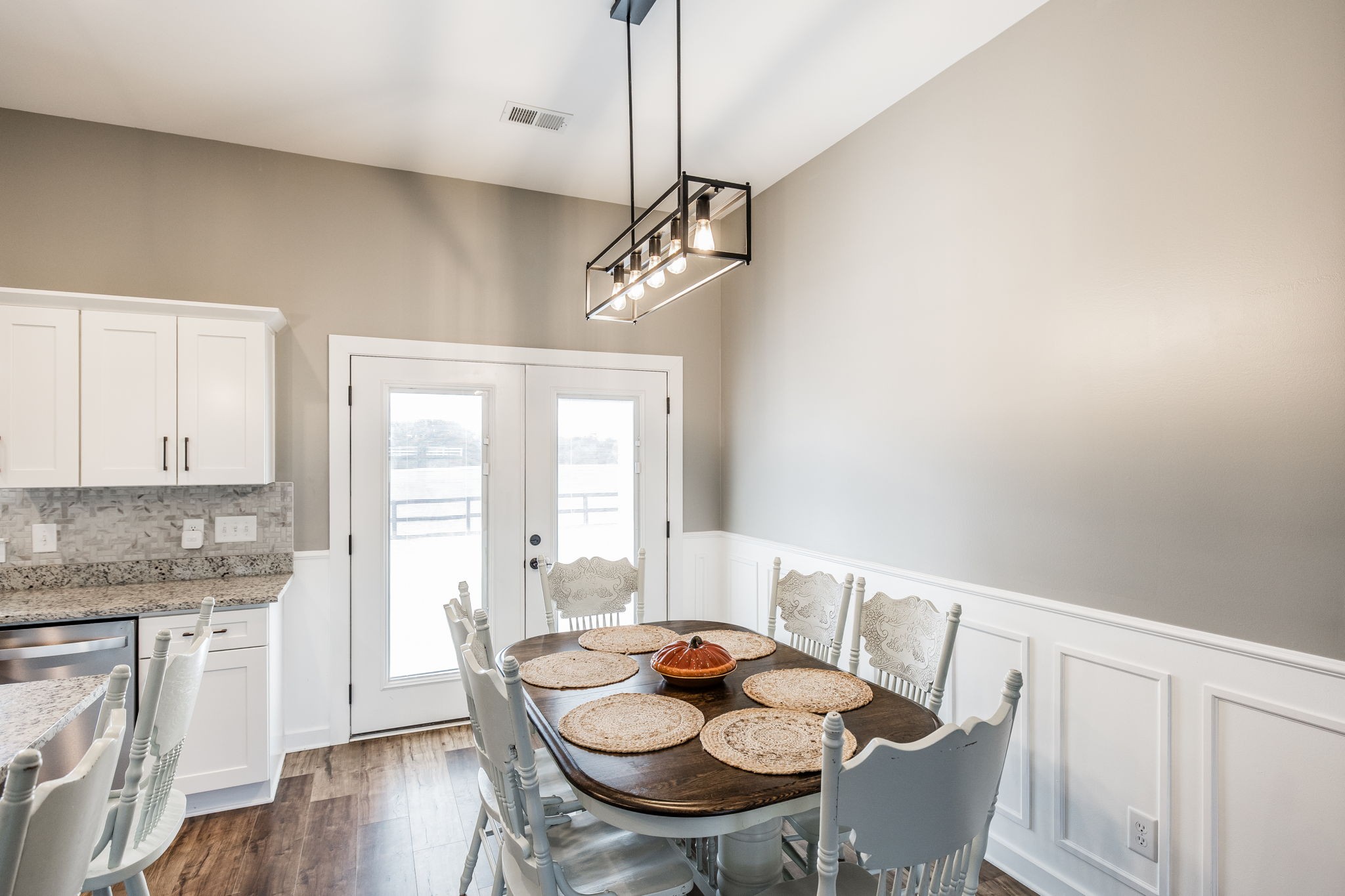 721 New Deal Potts Road Cottontown, TN 37048 - Photo 18 of 73 a view of a dining room with furniture wooden floor and chandelier