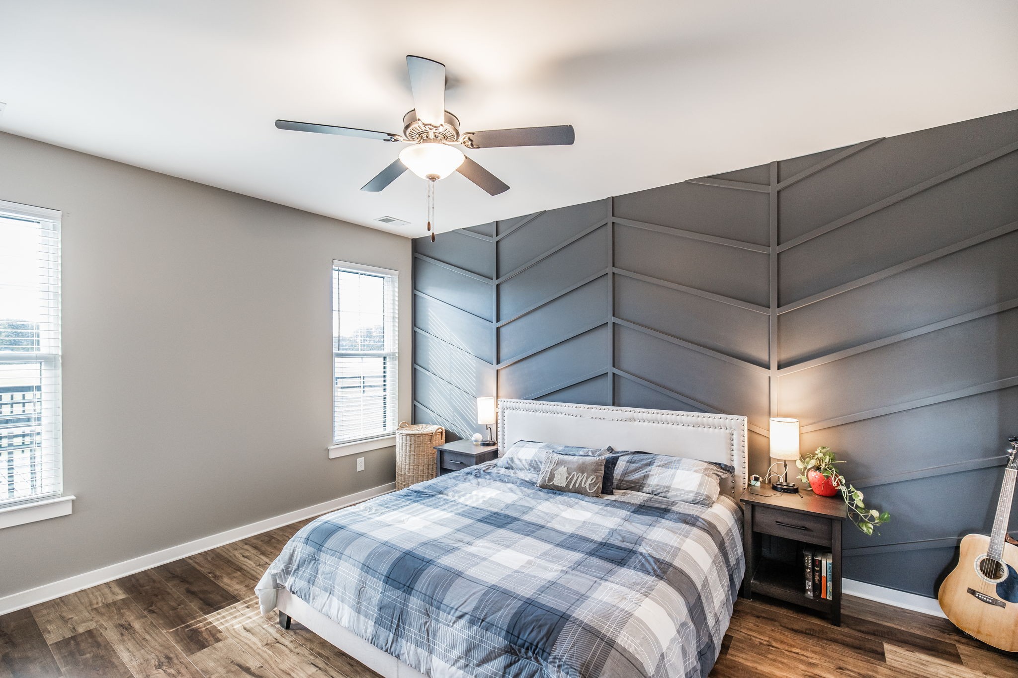 721 New Deal Potts Road Cottontown, TN 37048 - Photo 25 of 73 a bedroom with a bed and a chandelier