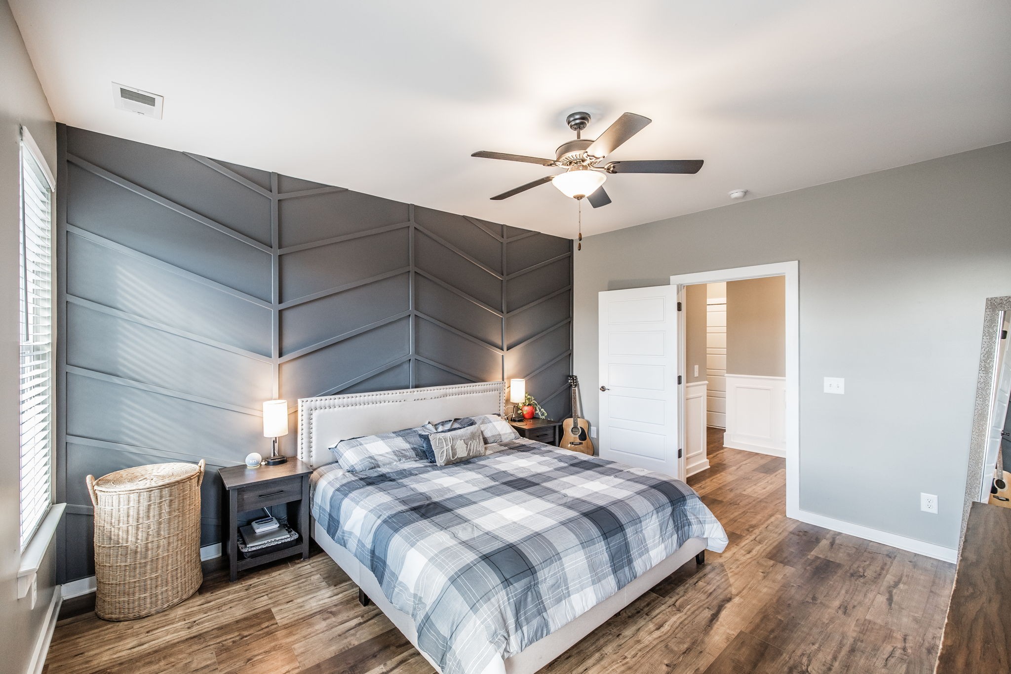 721 New Deal Potts Road Cottontown, TN 37048 - Photo 26 of 73 a bedroom with a bed and a chandelier