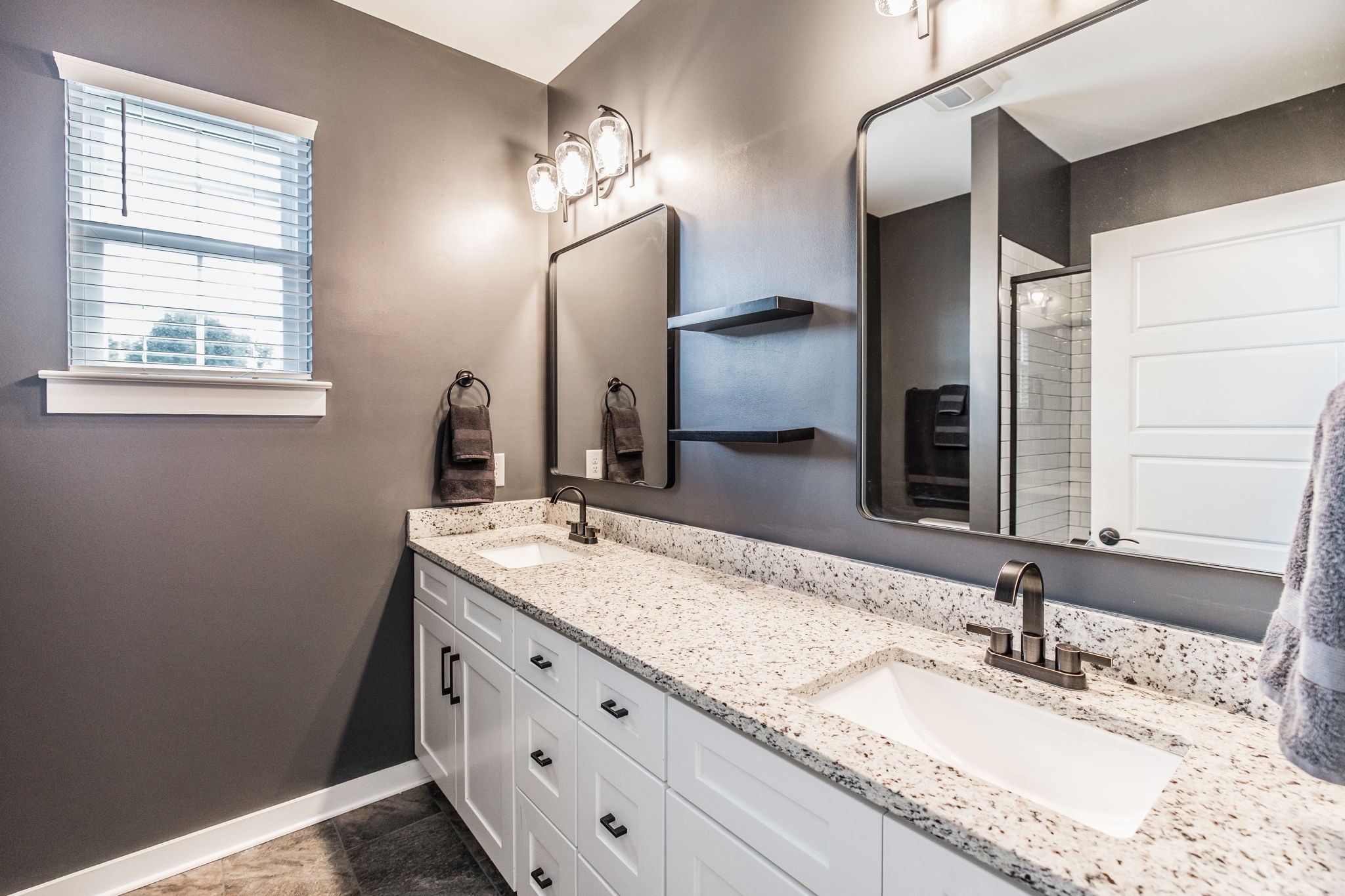 721 New Deal Potts Road Cottontown, TN 37048 - Photo 28 of 73 a bathroom with a granite countertop sink and a mirror