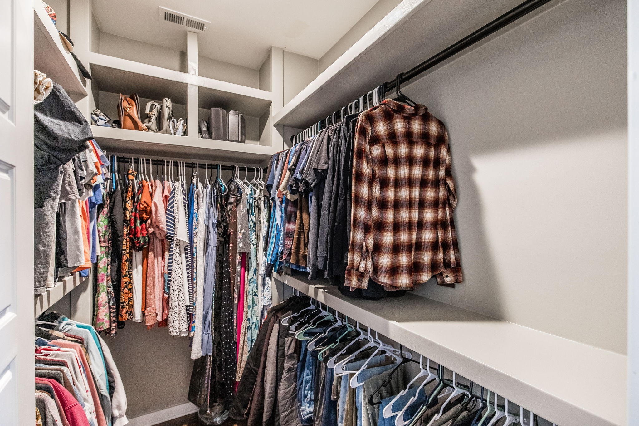 721 New Deal Potts Road Cottontown, TN 37048 - Photo 32 of 73 a view of walk in closet with clothes and shoes