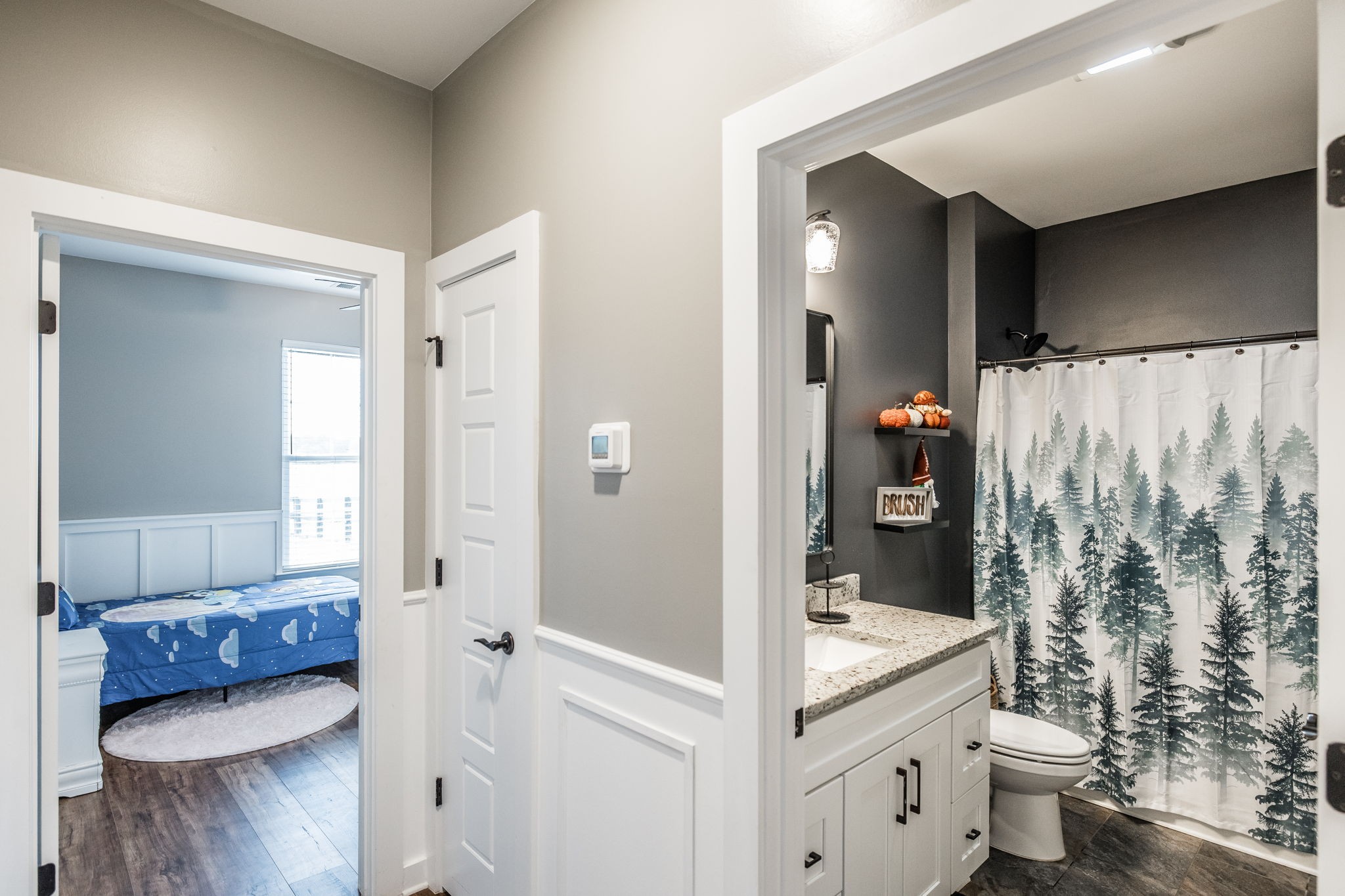 721 New Deal Potts Road Cottontown, TN 37048 - Photo 34 of 73 a bathroom with a double vanity sink toilet and shower