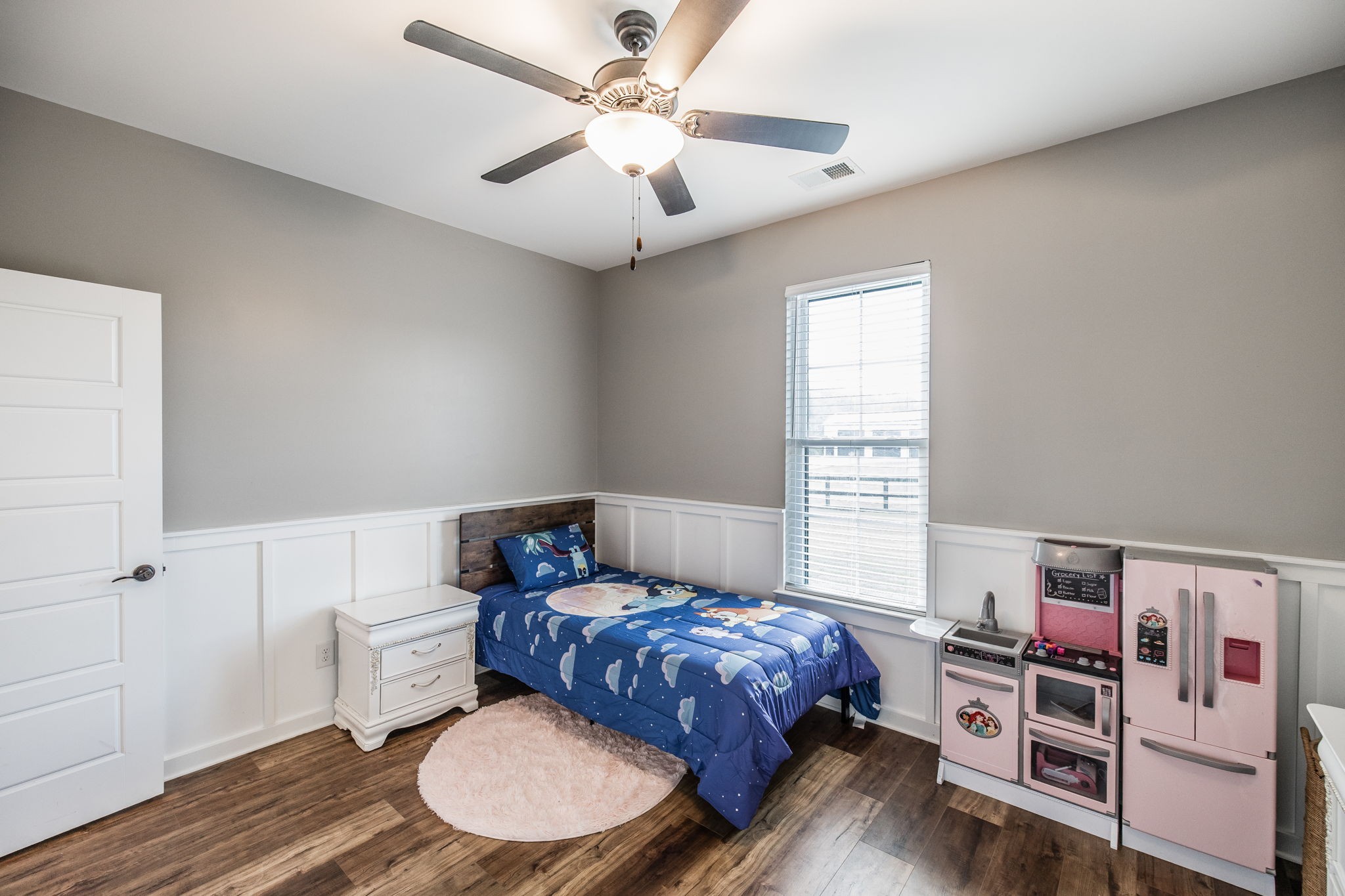 721 New Deal Potts Road Cottontown, TN 37048 - Photo 35 of 73 a bedroom with a bed and a chandelier