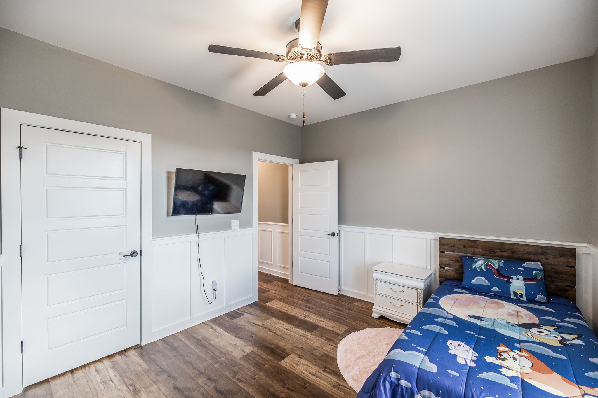 721 New Deal Potts Road Cottontown, TN 37048 - Photo 36 of 73 a bedroom with furniture and a flat screen tv