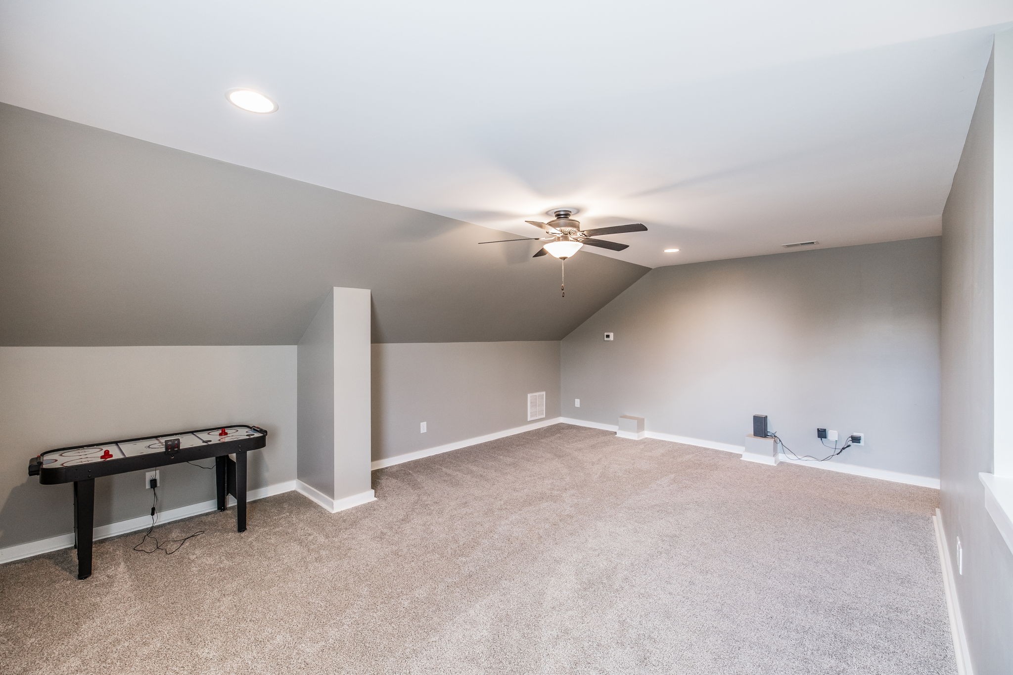 721 New Deal Potts Road Cottontown, TN 37048 - Photo 47 of 73 a view of an empty room with a chandelier fan