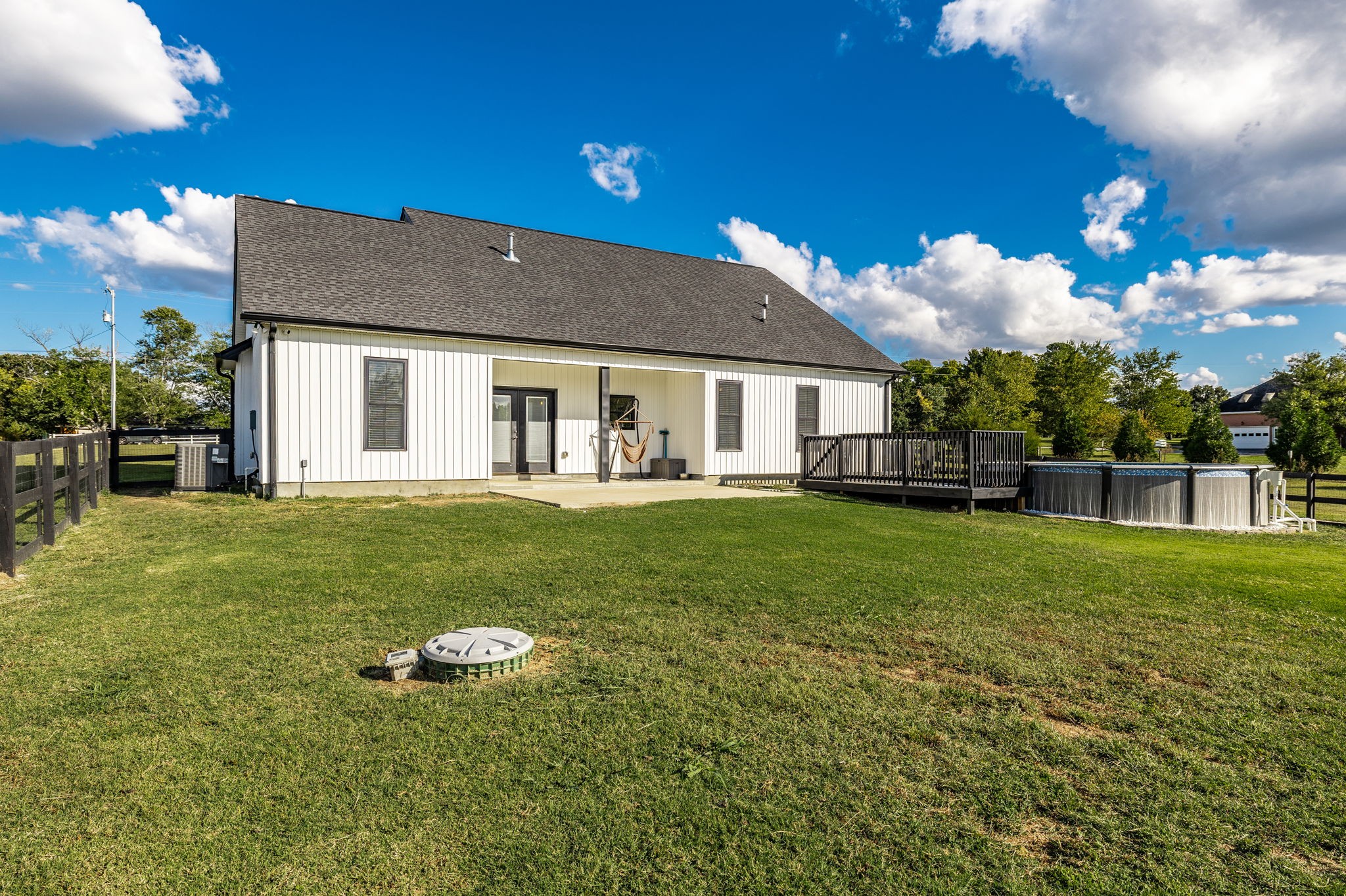 721 New Deal Potts Road Cottontown, TN 37048 - Photo 65 of 73 a backyard of a house with lots of green space