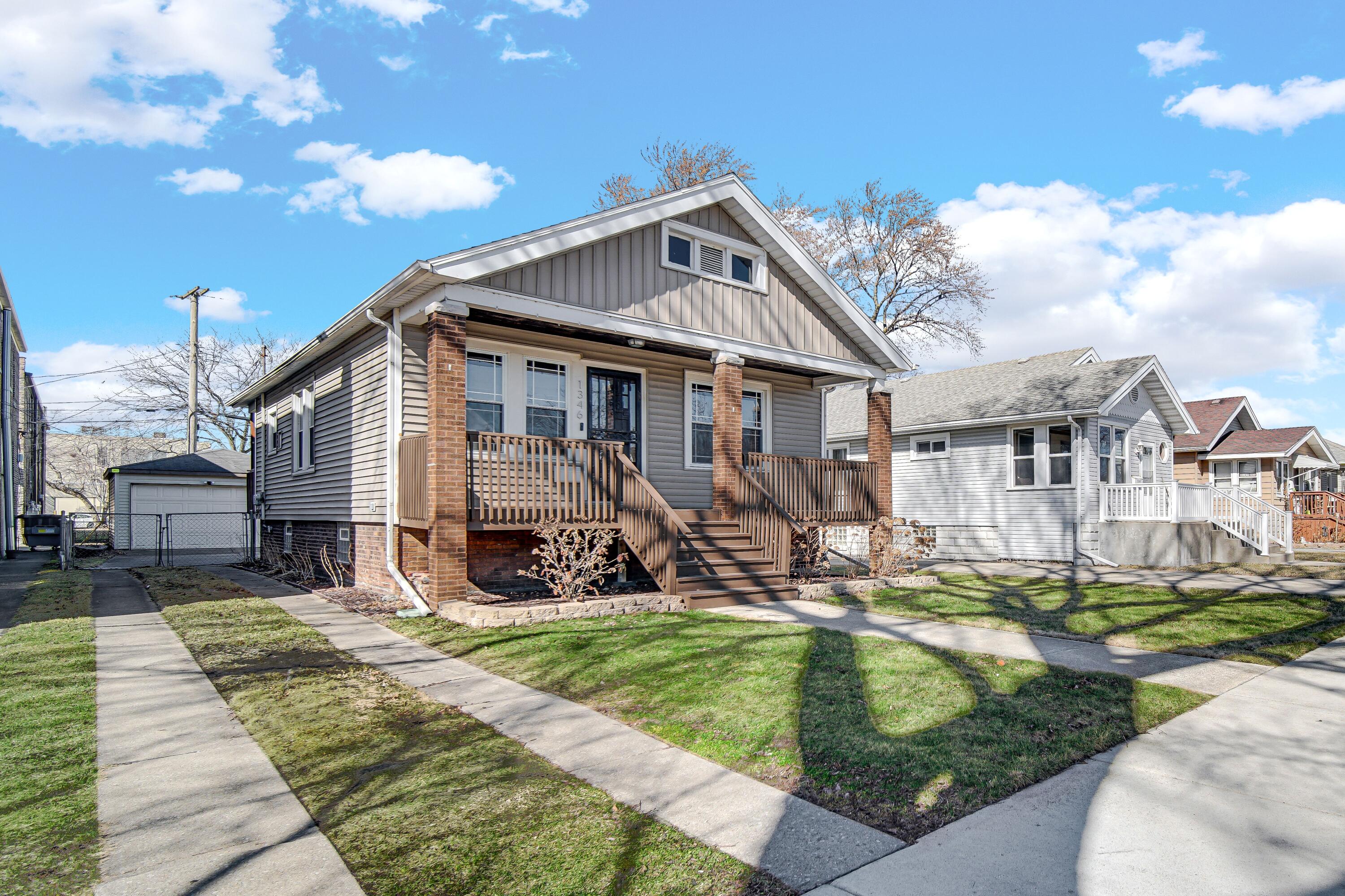 1346 Stanton Avenue Whiting, IN 46394 - Photo 1 of 19 a view of a house with swimming pool and sitting area