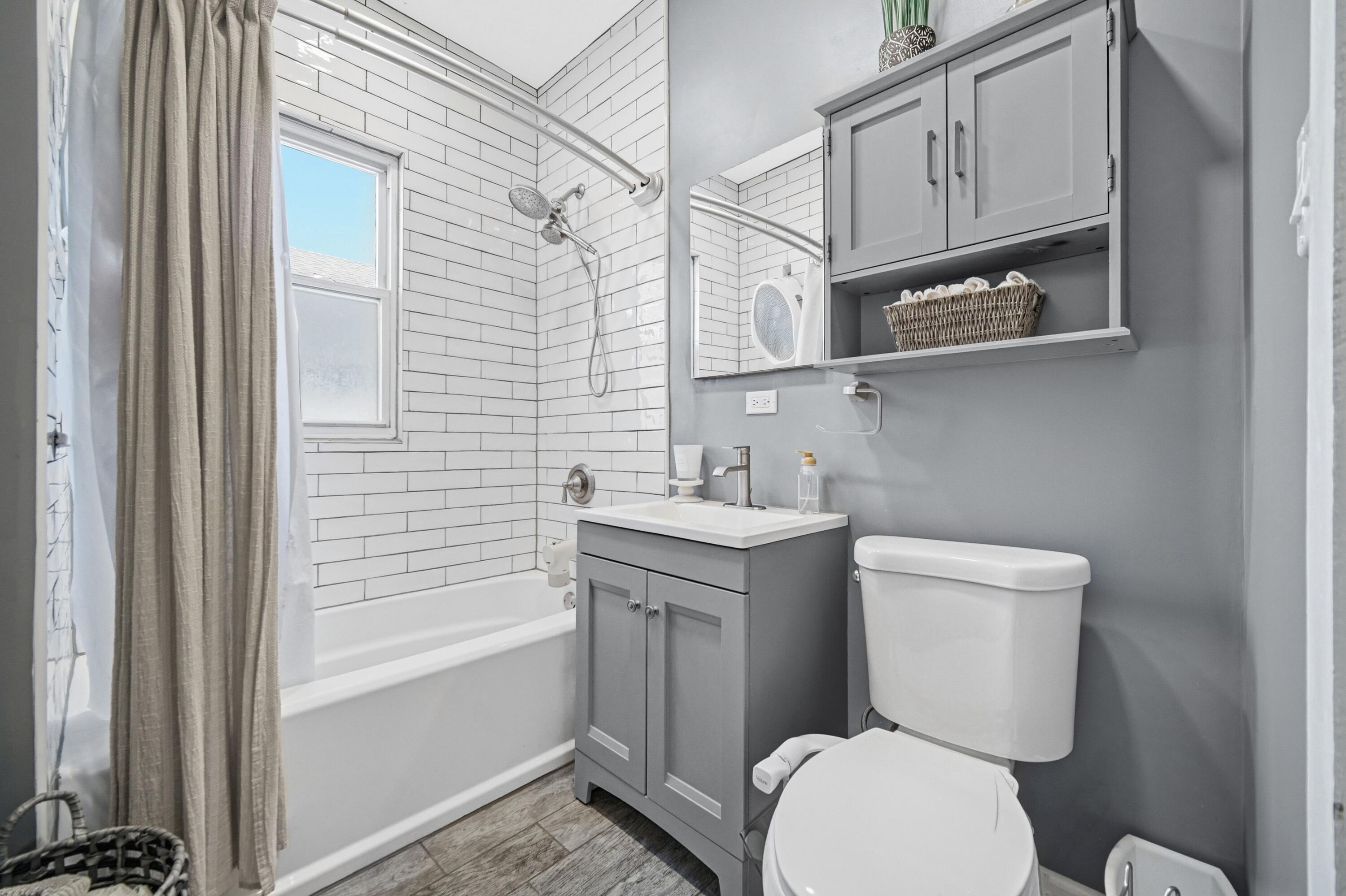 1346 Stanton Avenue Whiting, IN 46394 - Photo 12 of 19 a bathroom with a toilet a sink and bathtub