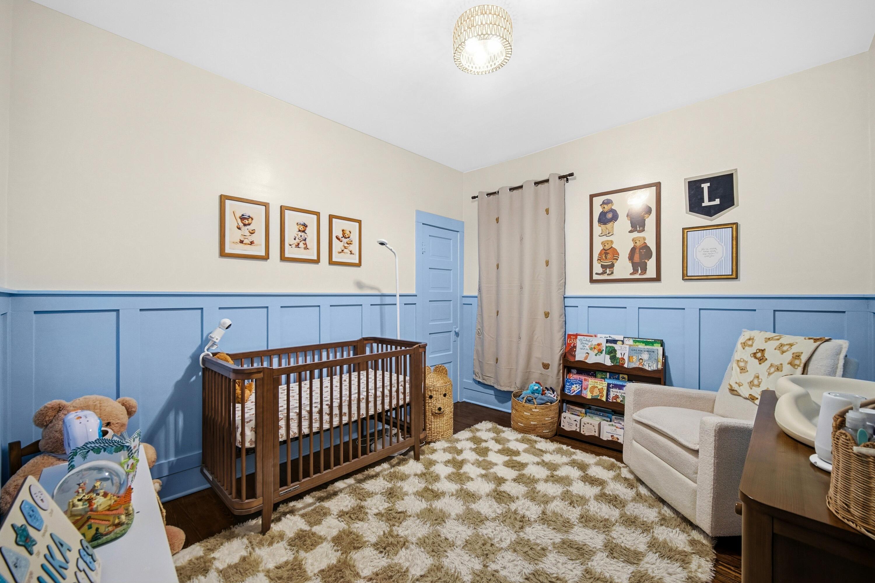 1346 Stanton Avenue Whiting, IN 46394 - Photo 13 of 19 a bedroom with furniture and a window