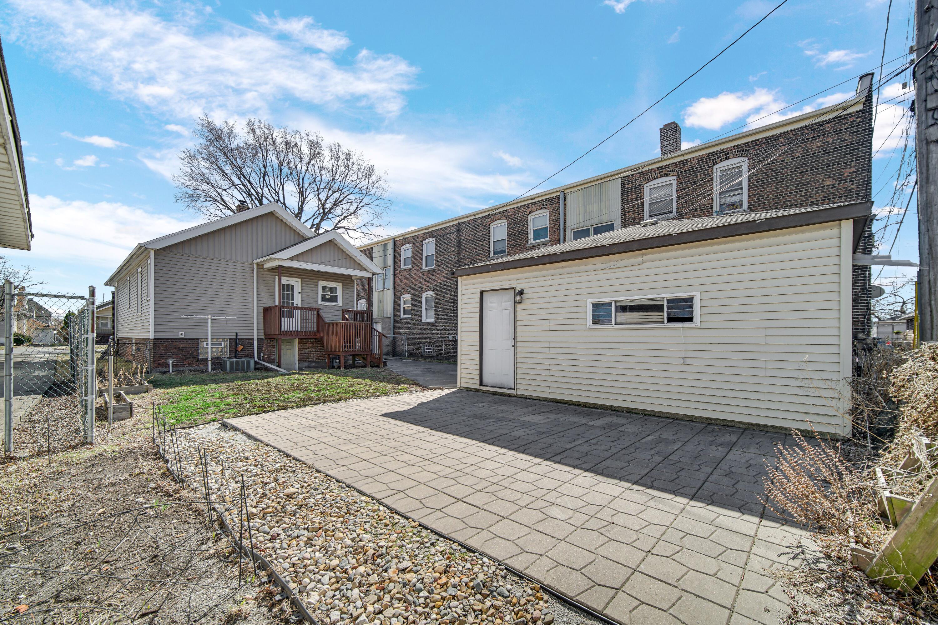 1346 Stanton Avenue Whiting, IN 46394 - Photo 18 of 19 a front view of a house with a yard