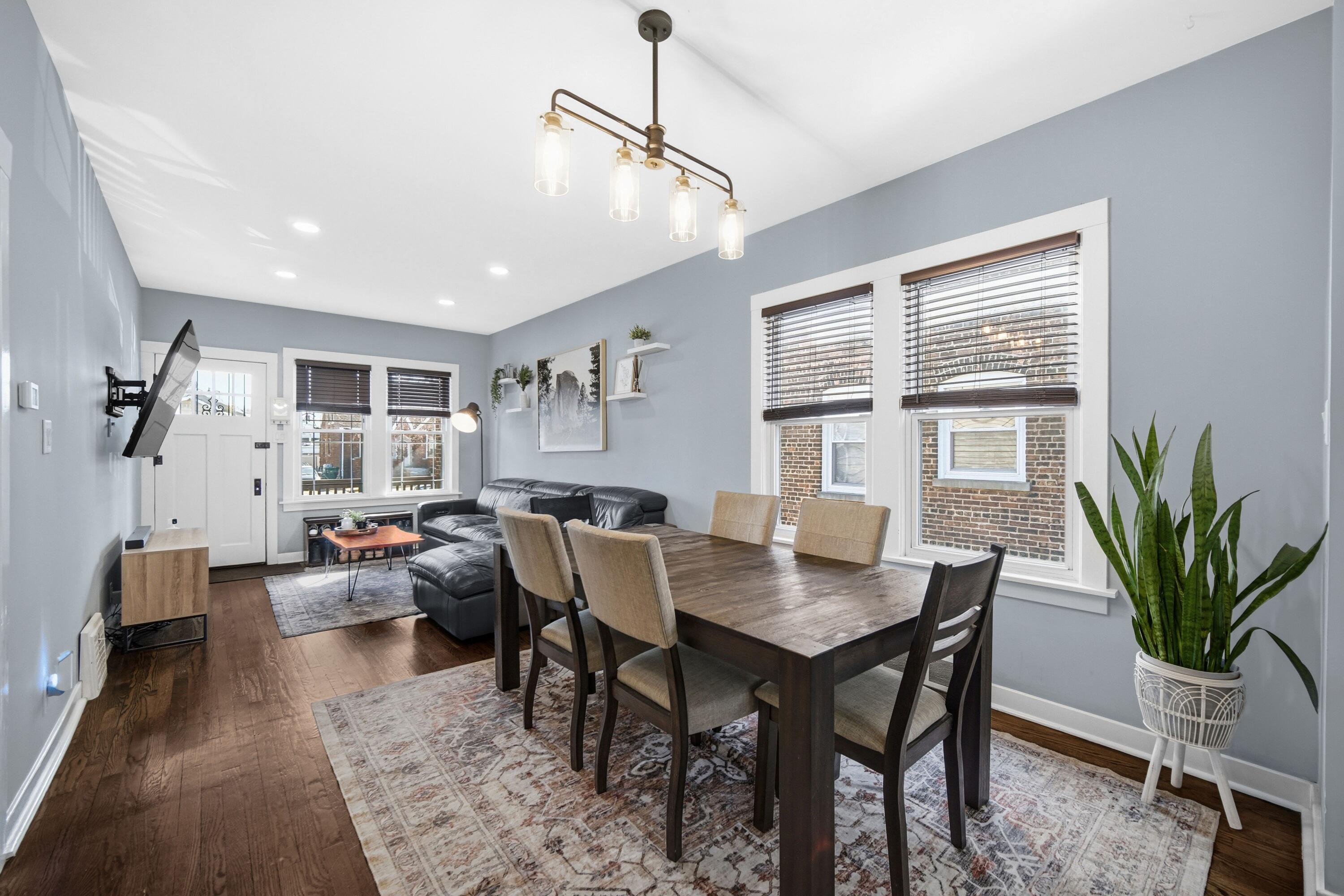 1346 Stanton Avenue Whiting, IN 46394 - Photo 5 of 19 a view of a dining room with furniture window and wooden floor